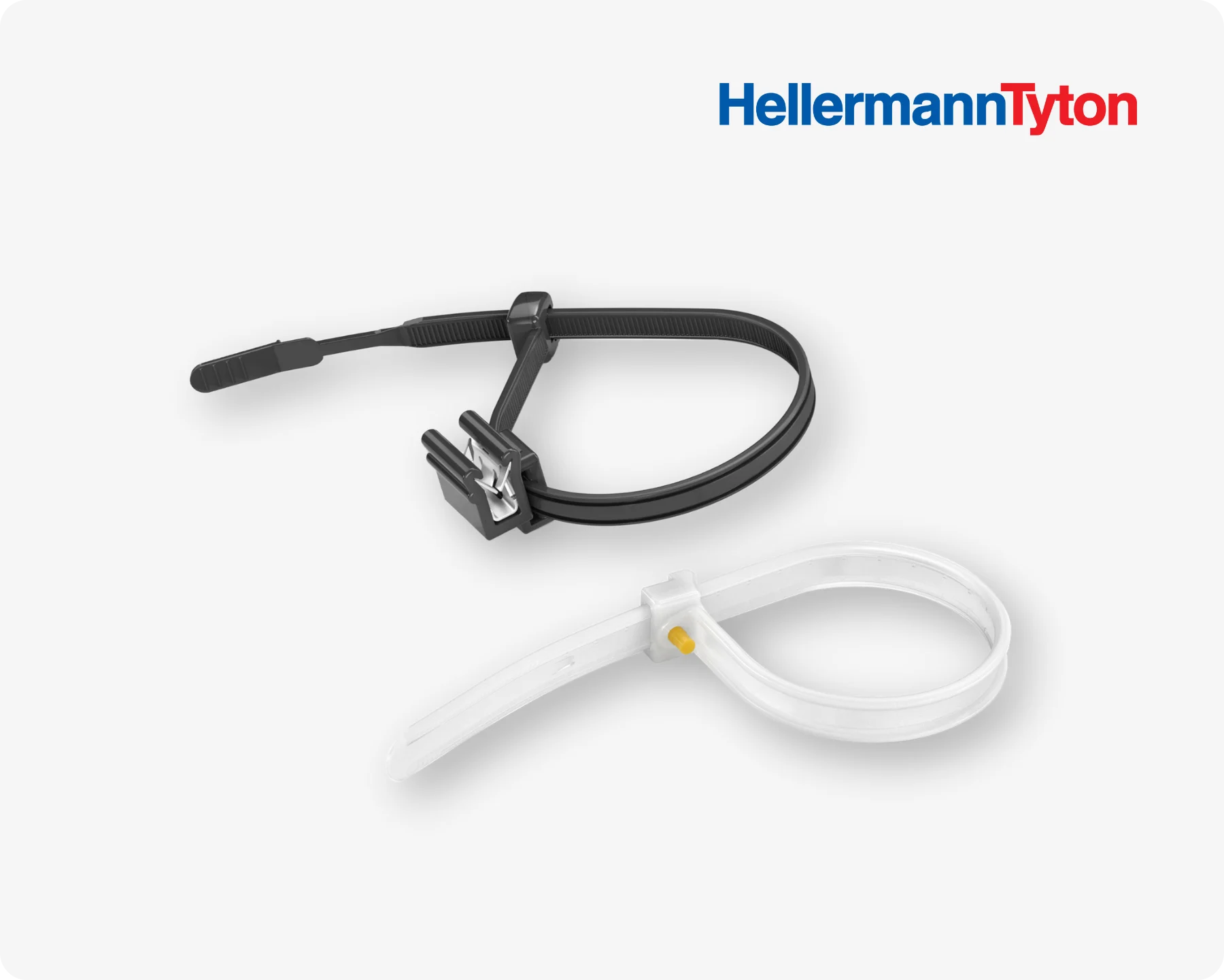 A black and a white HellermannTyton cable tie on light grey background.