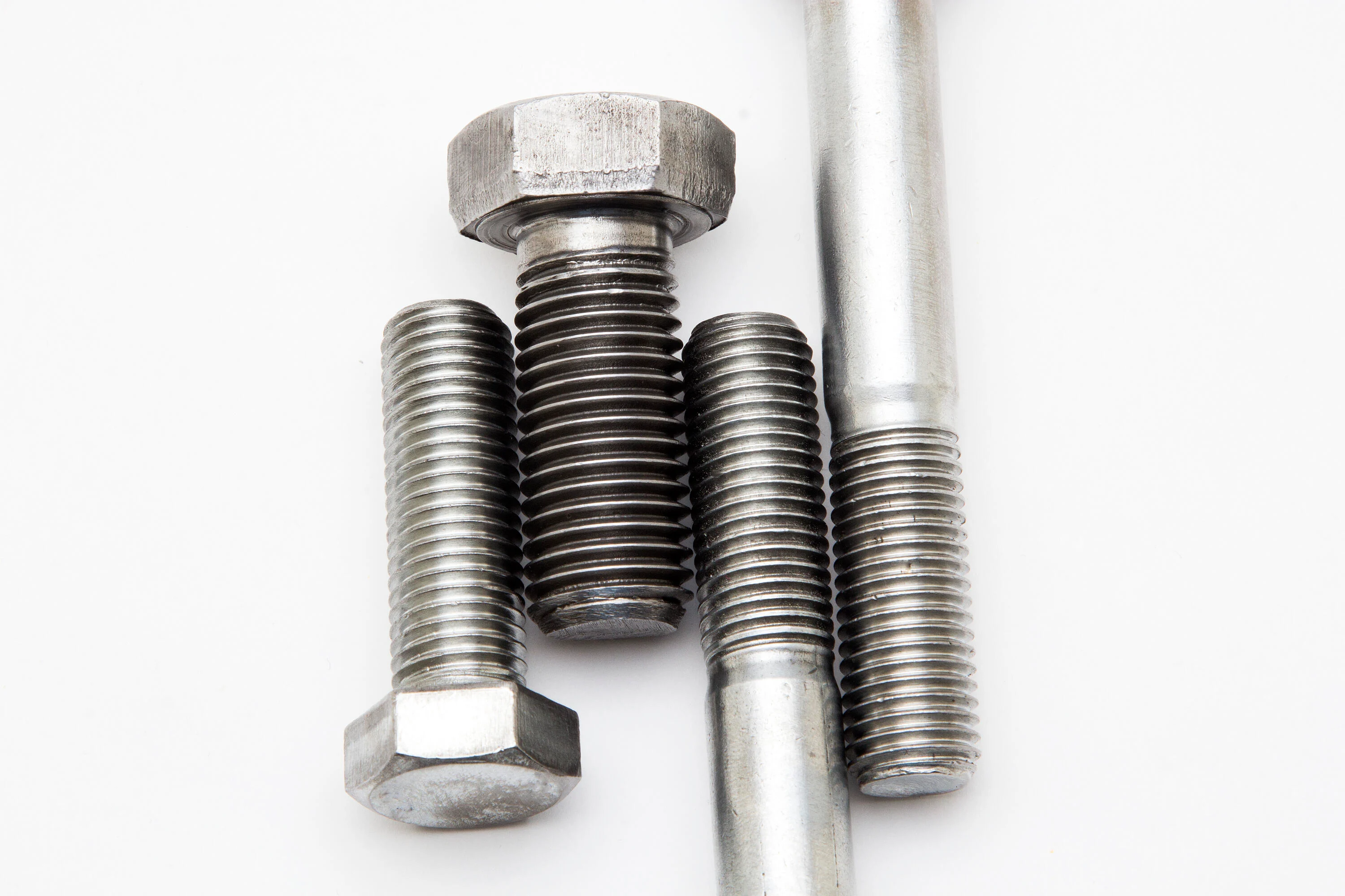 Different bolts on white background