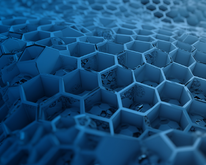 Nahaufnahme einer blauen, wabenförmigen Struktur, symbolisiert innovative Verbindungstechnik für Kunststoffe.