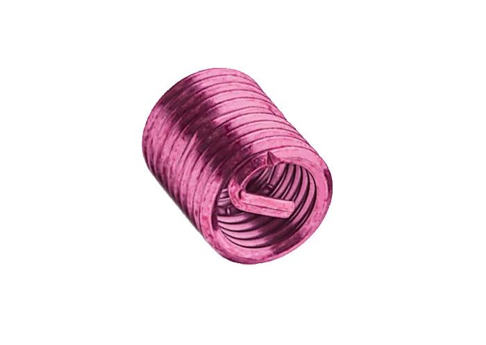 Pinkfarbener LOCKFIL Drahtgewindeeinsatz aus Metall mit spiraliger Struktur und Einbauzapfen auf weißem Hintergrund.