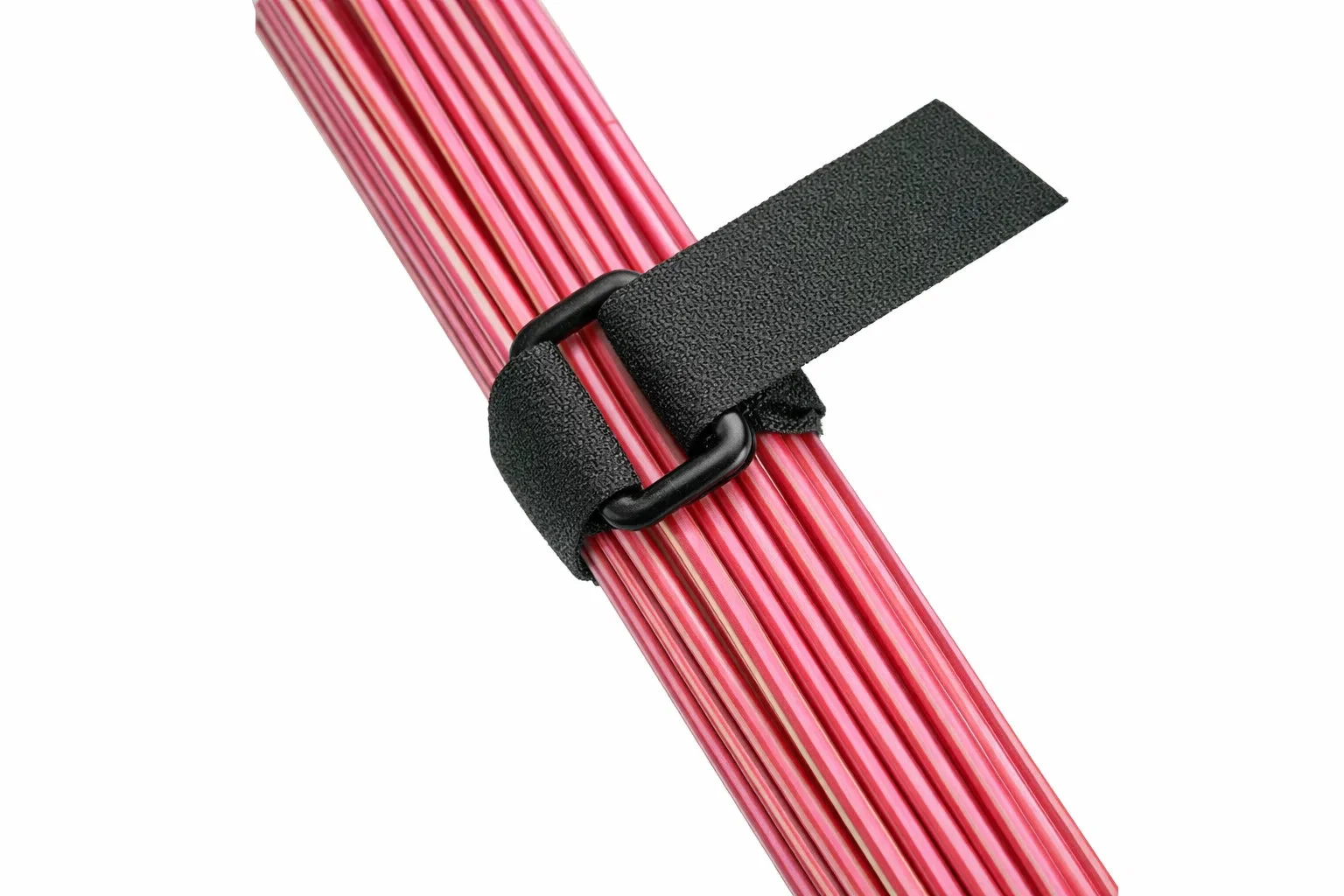 A bundle of red cable ties, held together with a black strap