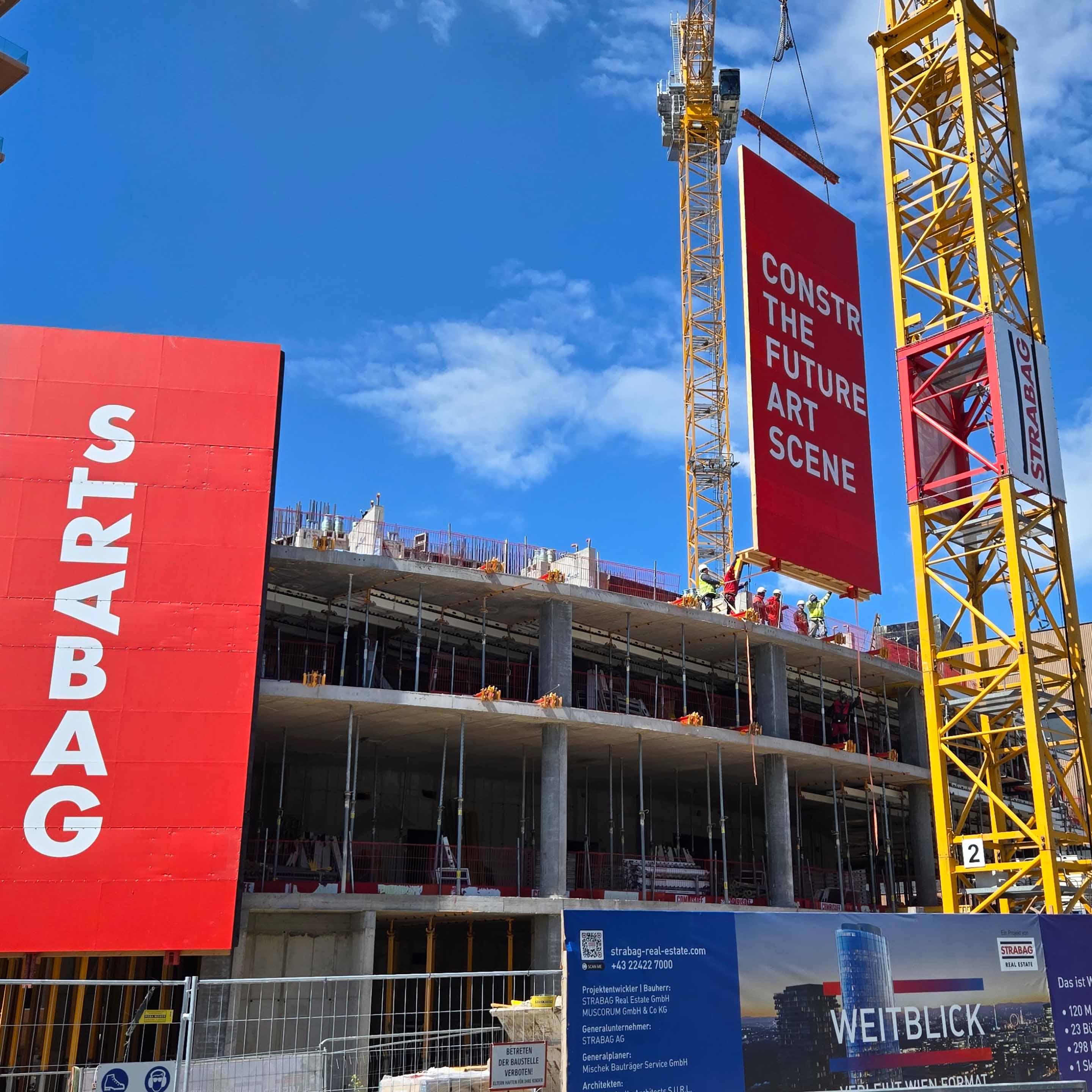 The finished panels are being connected using a crane.