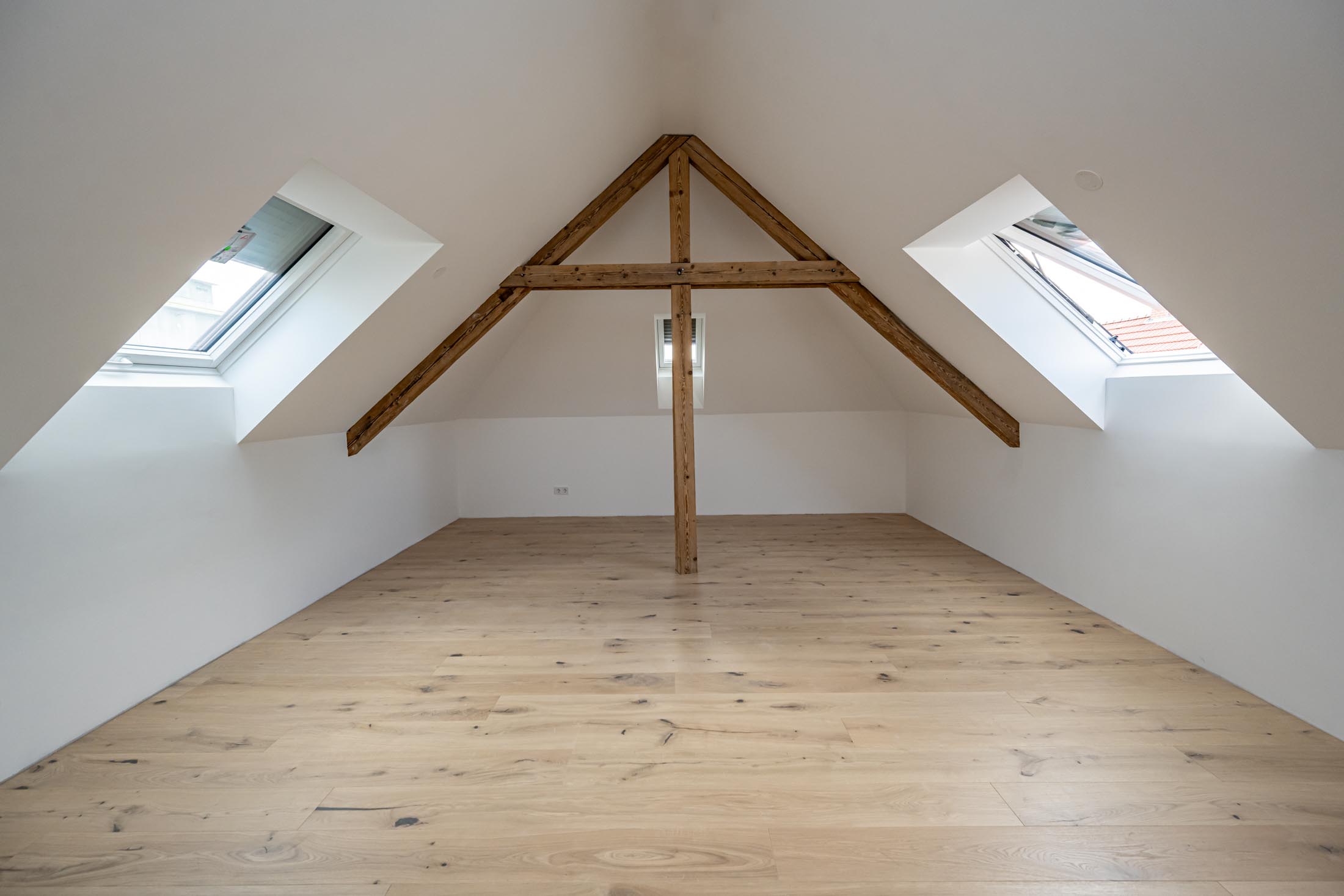Foto: Dachbodenrevitalisierung im Projekt trees in Linz der STRABAG Real Estate.