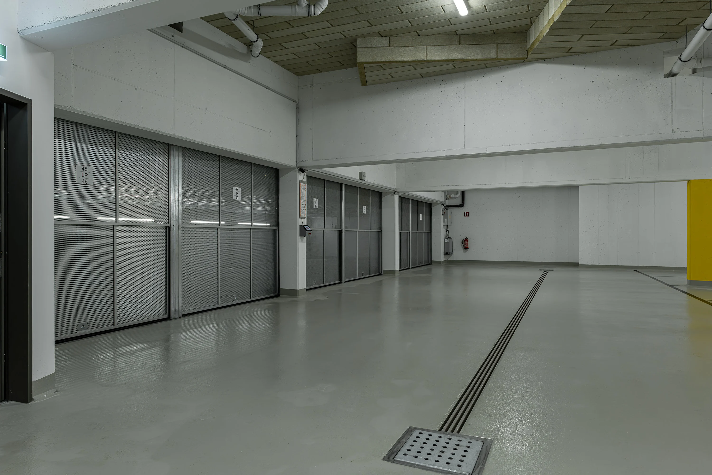 Parken ohne Stress - Freie Tiefgaragenplätze Foto: Garage im Projekt Mein Statz in Neumarkt am Wallersee