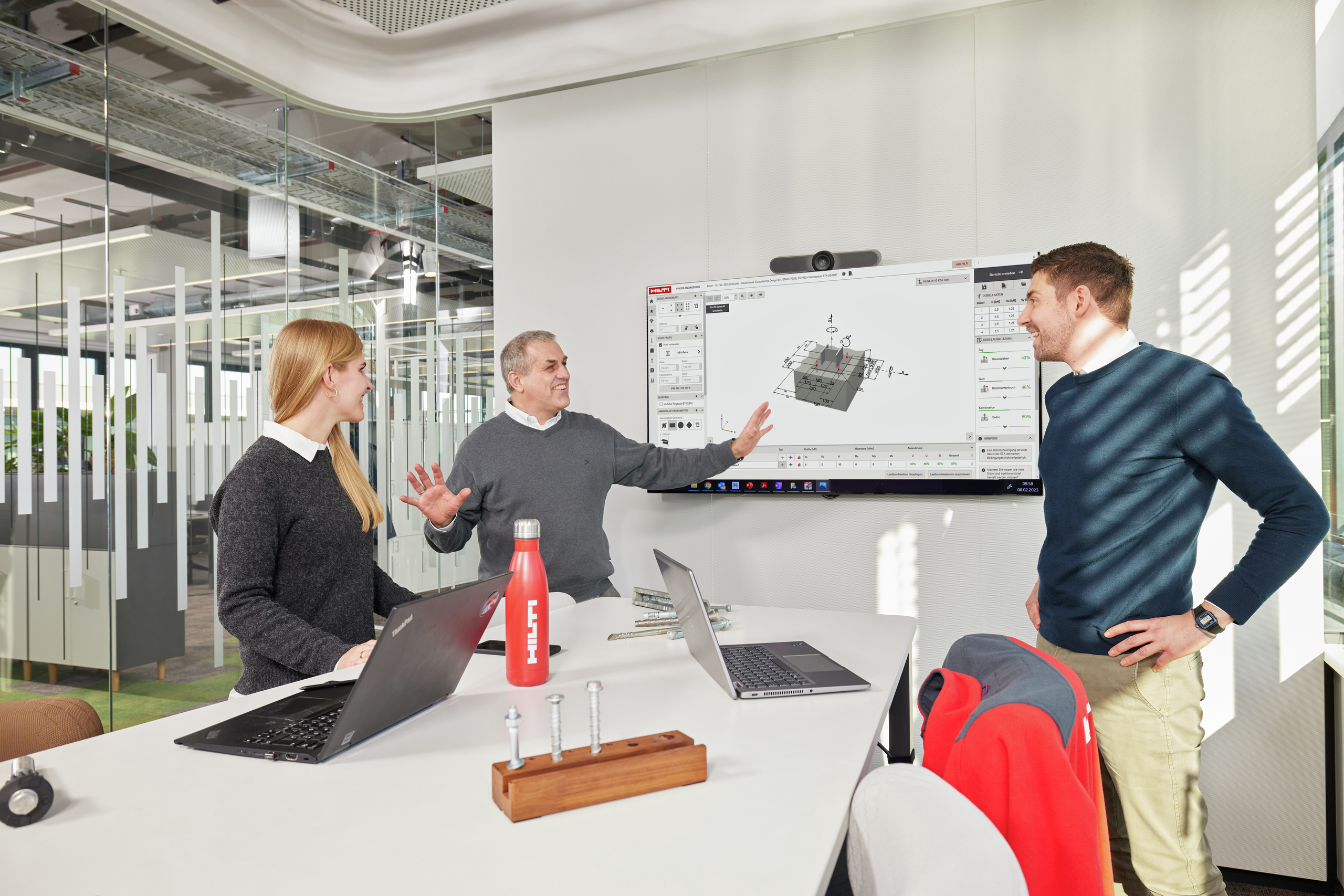 Engineers viewing PROFIS on a large screen