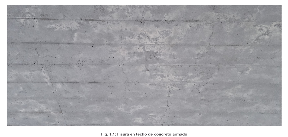 Superficie de concreto gris claro con textura sutil, ligeras manchas y pequeñas grietas, que conforman un fondo industrial neutro.
