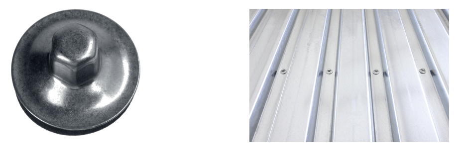 Metal roofing fastener with hex head and washer shown alongside an installed metal roof deck, illustrating the fastener's appearance and its application on corrugated roofing panels.