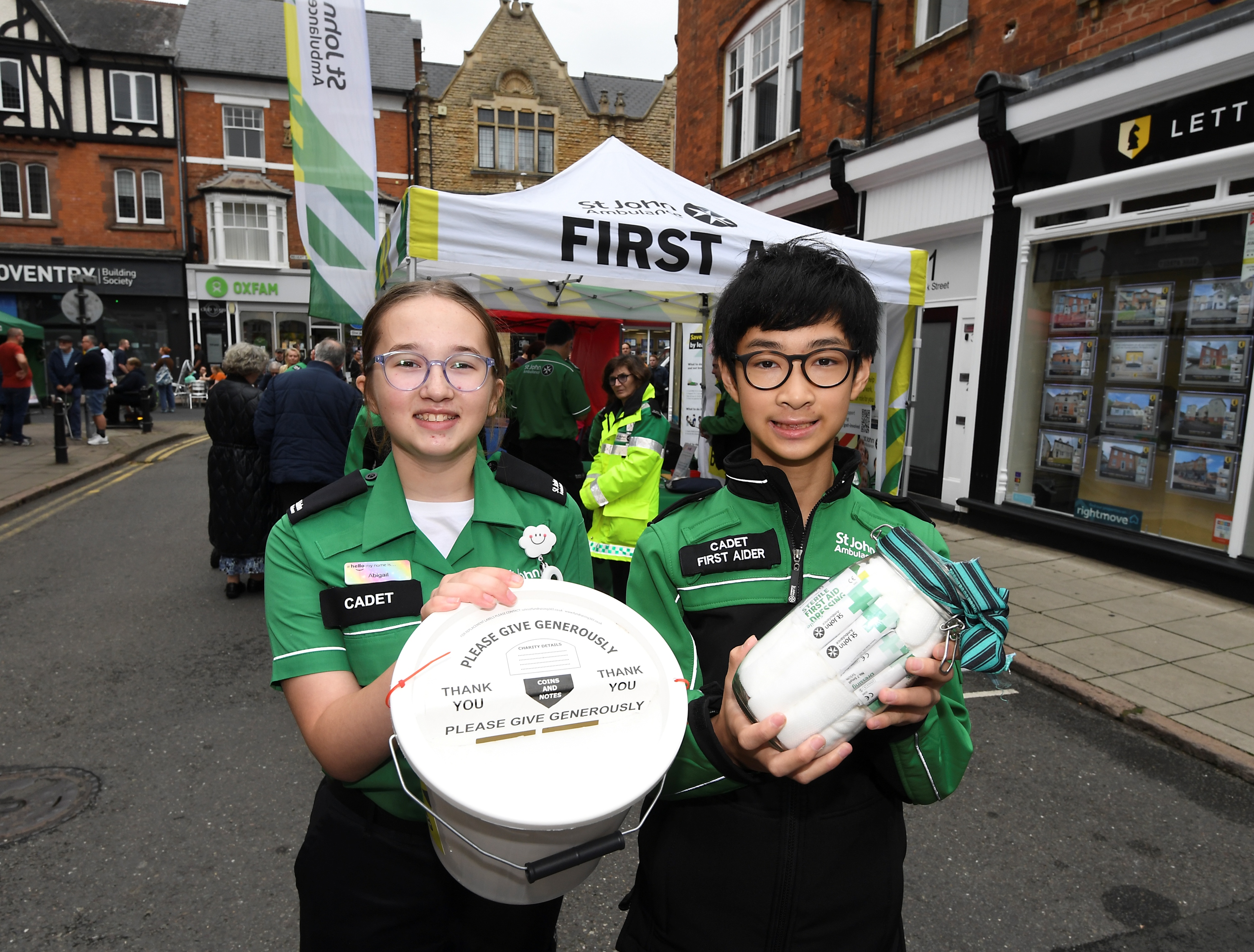 Two St John ambulance Cadets collecting money for the charity.