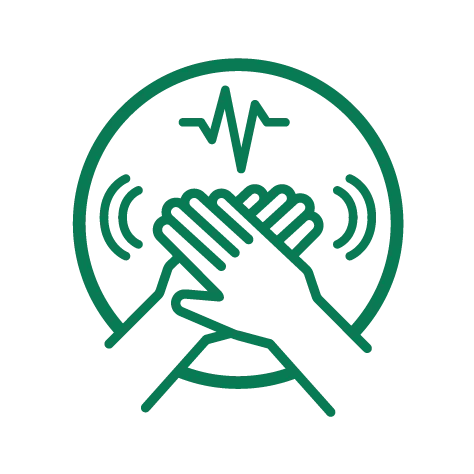 An green coloured icon of hands in chest compression position with waves radiating either side of them, surrounded by a circle and heartbeat symbol.