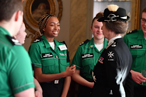 A photograph of five Cadets meeting Princess Anne, who is wearing ceremonial uniform.