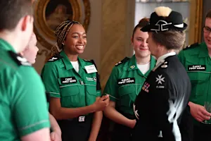 A photograph of five Cadets meeting Princess Anne, who is wearing ceremonial uniform.