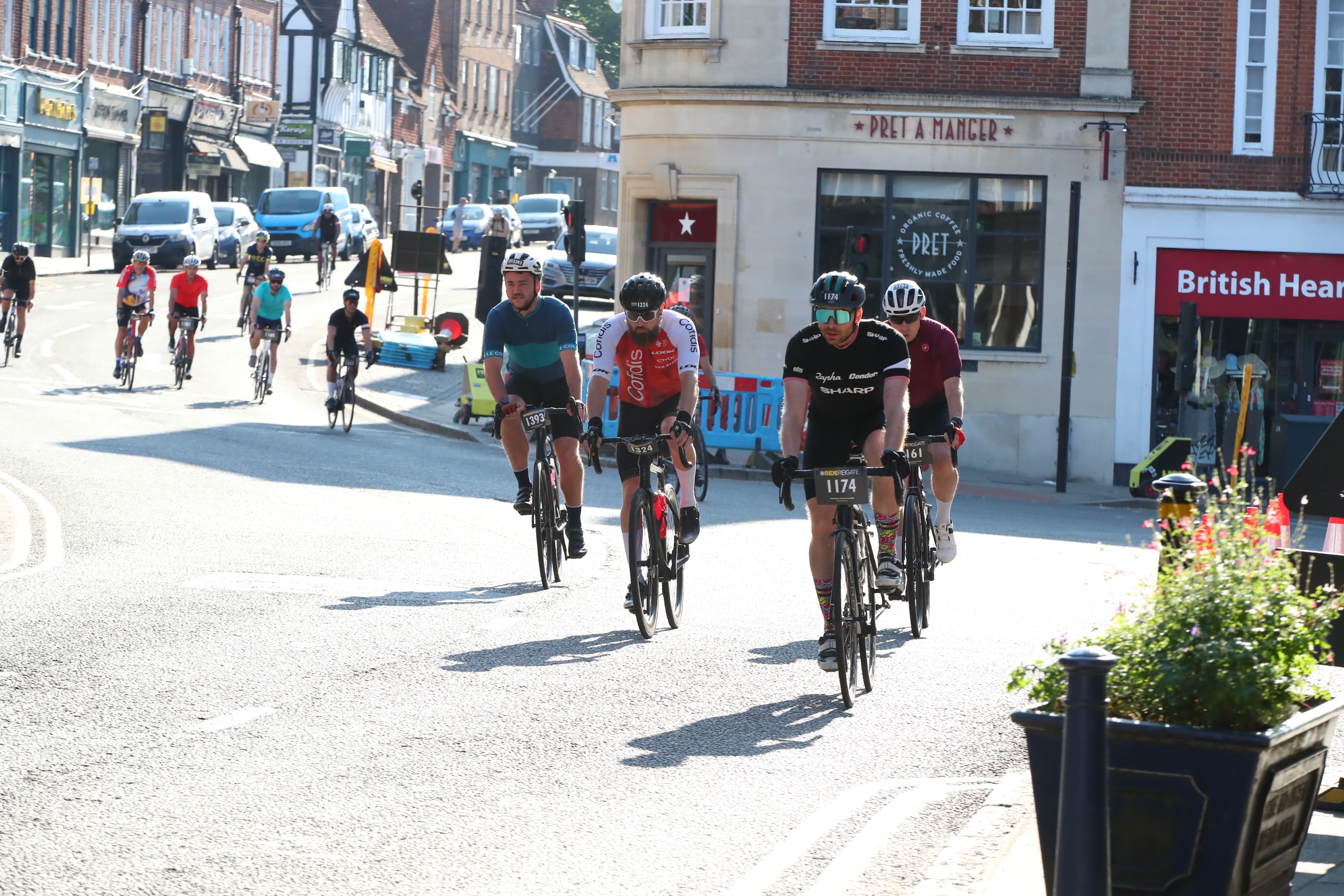 A group of cyclists on the road, taking part in Ride Reigate.
