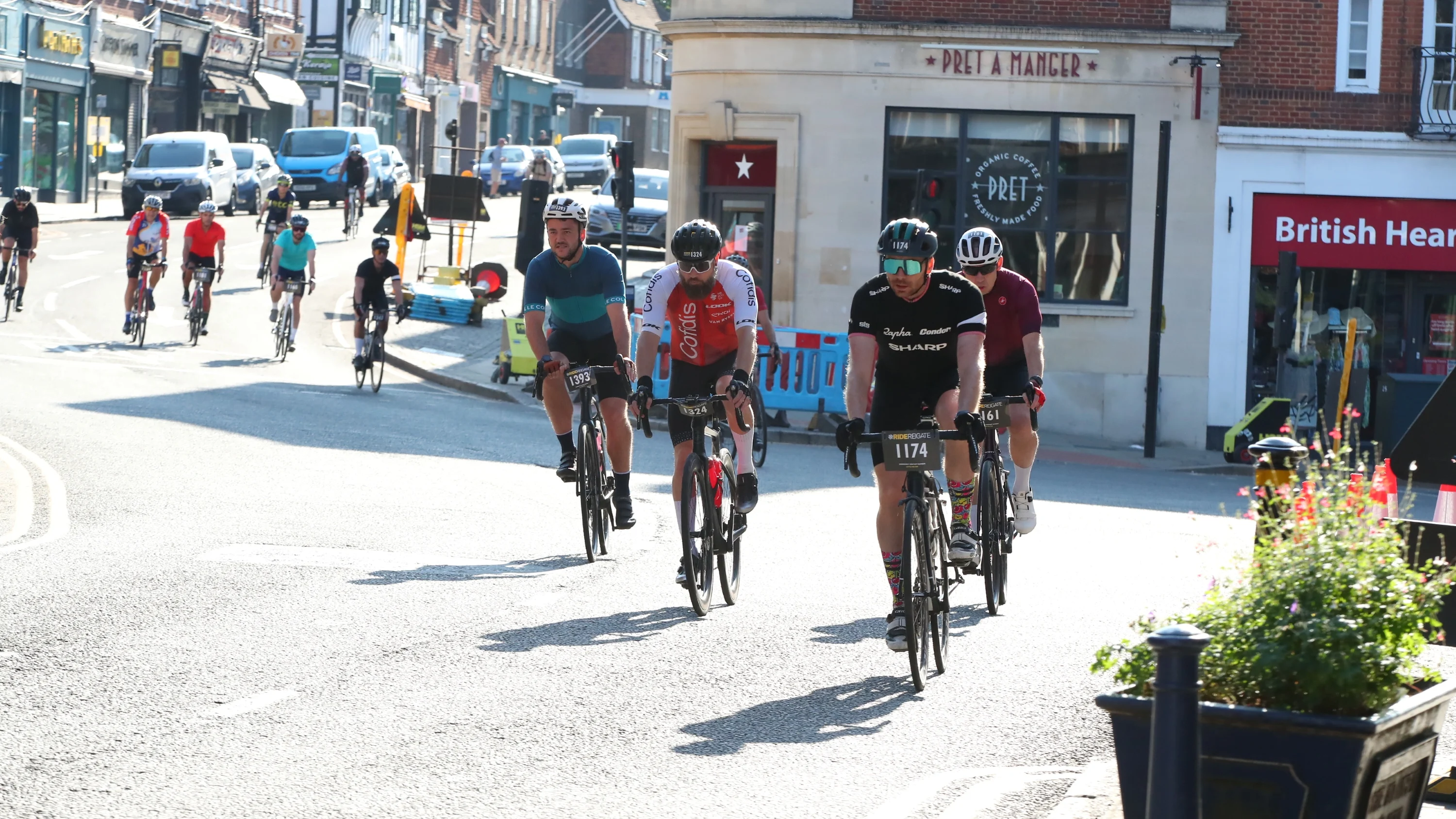 A group of cyclists on the road, taking part in Ride Reigate.