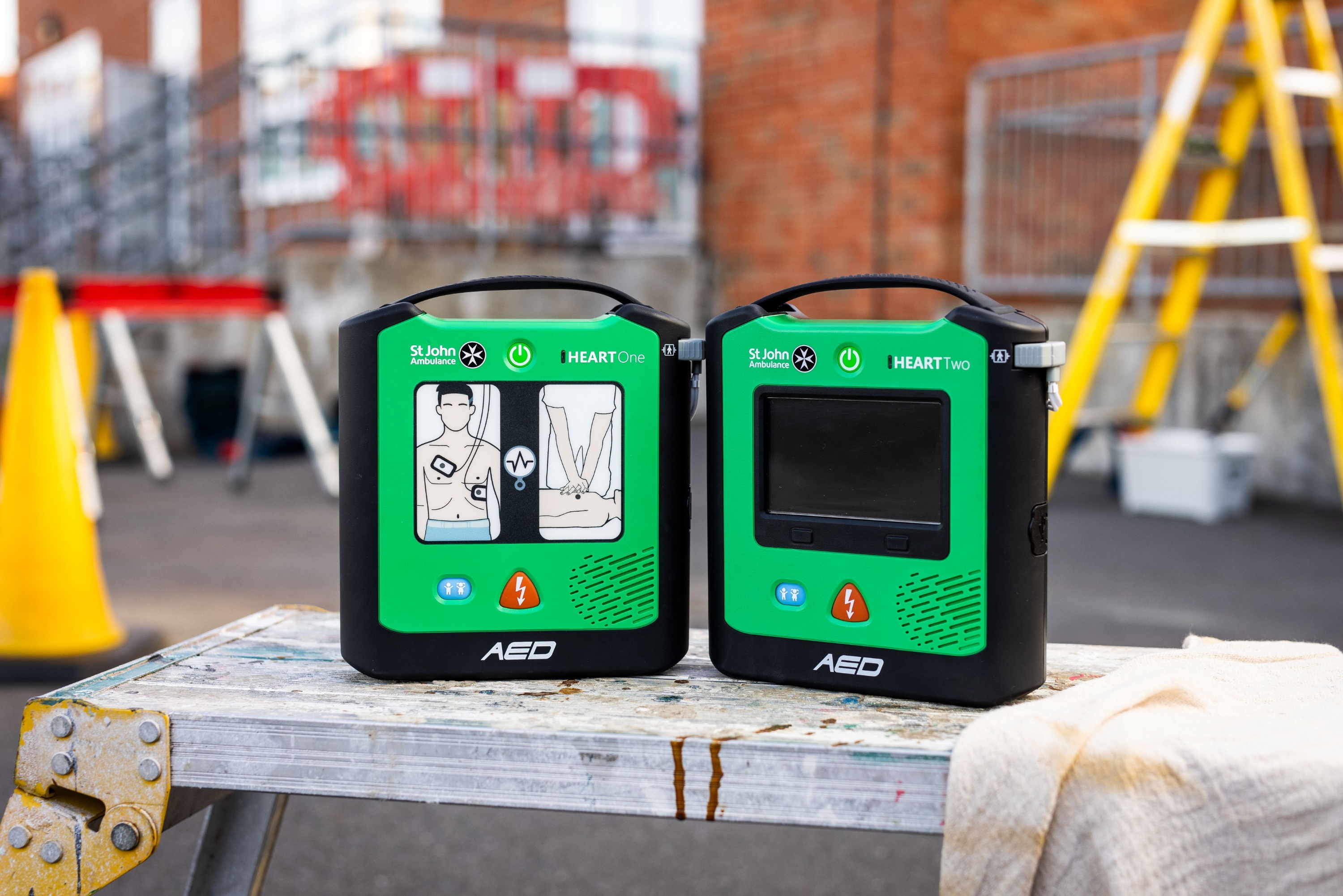 A St John Ambulance defibrillator on a construction site.