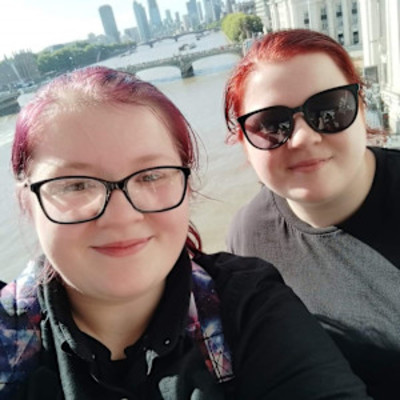 A selfie of Eve and Lauren overlooking a river.