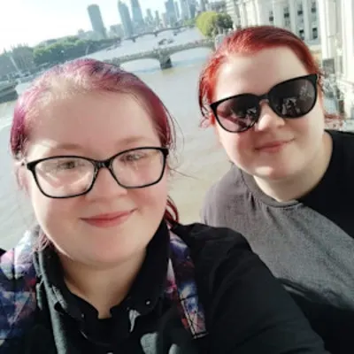 A selfie of Eve and Lauren overlooking a river.