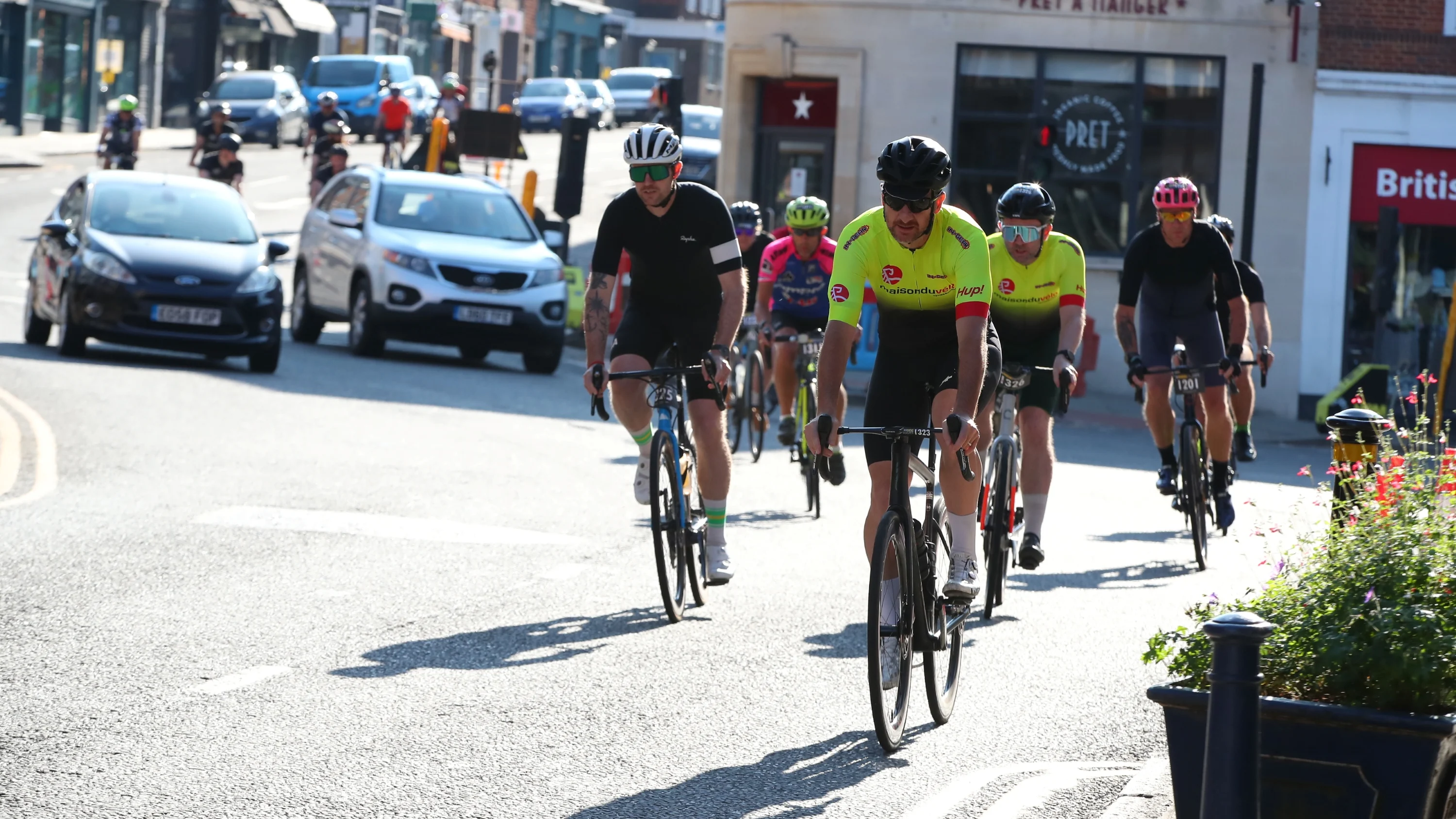 A group of cyclists on the road, taking part in Ride Reigate.