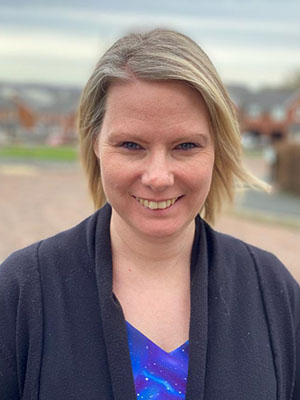 A photo of Emma smiling.