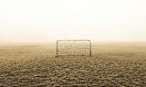 Football goal in mist