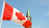 Decorative image of Canadian flag in front of the Parliament Building in Ottawa for article
