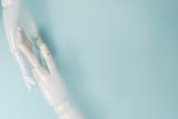 Decorative image of two robot hands for article