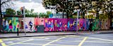Street art wall painting of community members