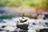 Decorative image of stacked pebbles for article