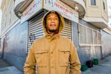 boston-paying-gang-members-400-week-go-college_asset_gio-hood-up-looks-to-side