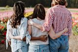Decorative image of women with their arms around each other for article
