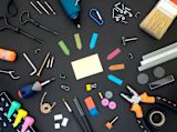 Decorative image of coloured tools and stationery for An introduction to policymaking lesson 5.1