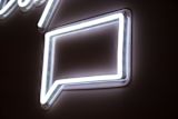 Decorative image of a neon sign for an article