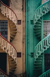 Decorative image of two staircases in different colours for article