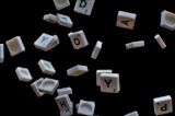 scrabble letters falling