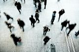 People walking busy street