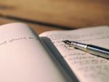 Decorative image of pen and paper for article