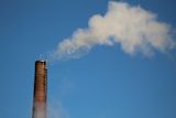 Decorative image of smoke from a tower for an article