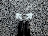 Decorative image of feet with two arrows for article
