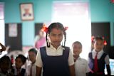 girls-covid-19-power-privilege-gender-development_asset_photo-1572847748080-bac263fae977
