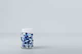 Bottle of blue pills