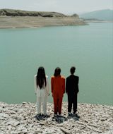 Decorative image of three women standing by a lake for article