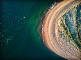 Decorative image of beach from birds-eye view for article