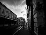 colonial-style buildings on a dark street