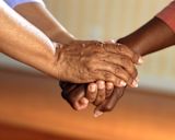 Decorative image of diverse hands for social care article