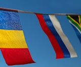 flags against blue sky