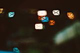 Email icons on a dark background