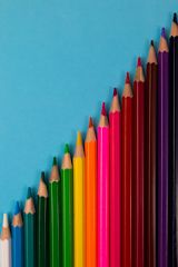 coloured pencils of different sizes