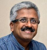 Decorative image of Ramaswami "Balu" Balasubramaniam