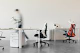 Person walking away from desk
