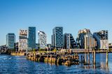 Picture of new buildings on the Oslo waterfront from the viewpoint of an old pier for article.