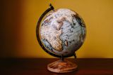 Globe on yellow background